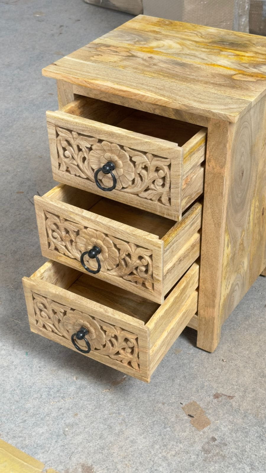 Handcarved Sheesham wood 3-drawer side table with floral detailing and black ring pulls