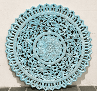 Decorative wall art panel with intricate patterns in a light blue color on a neutral background.