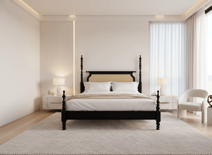 Modern bedroom with a black bed frame, white bedding, and minimal decor.