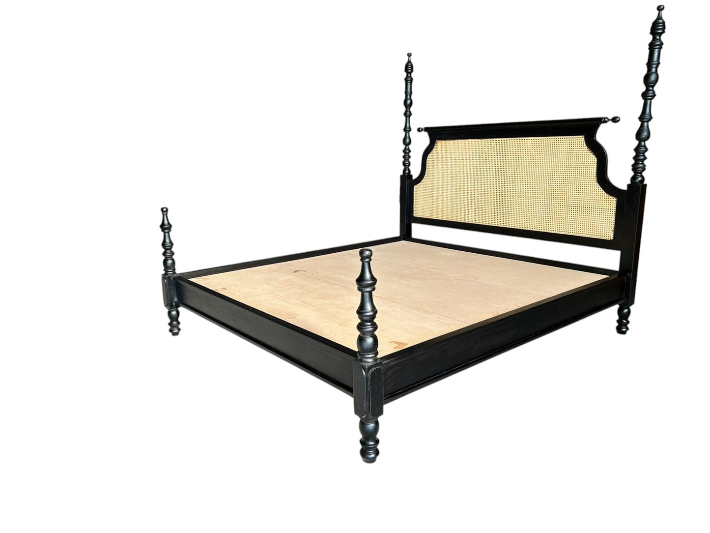 Black bed frame with woven backrest on a white background