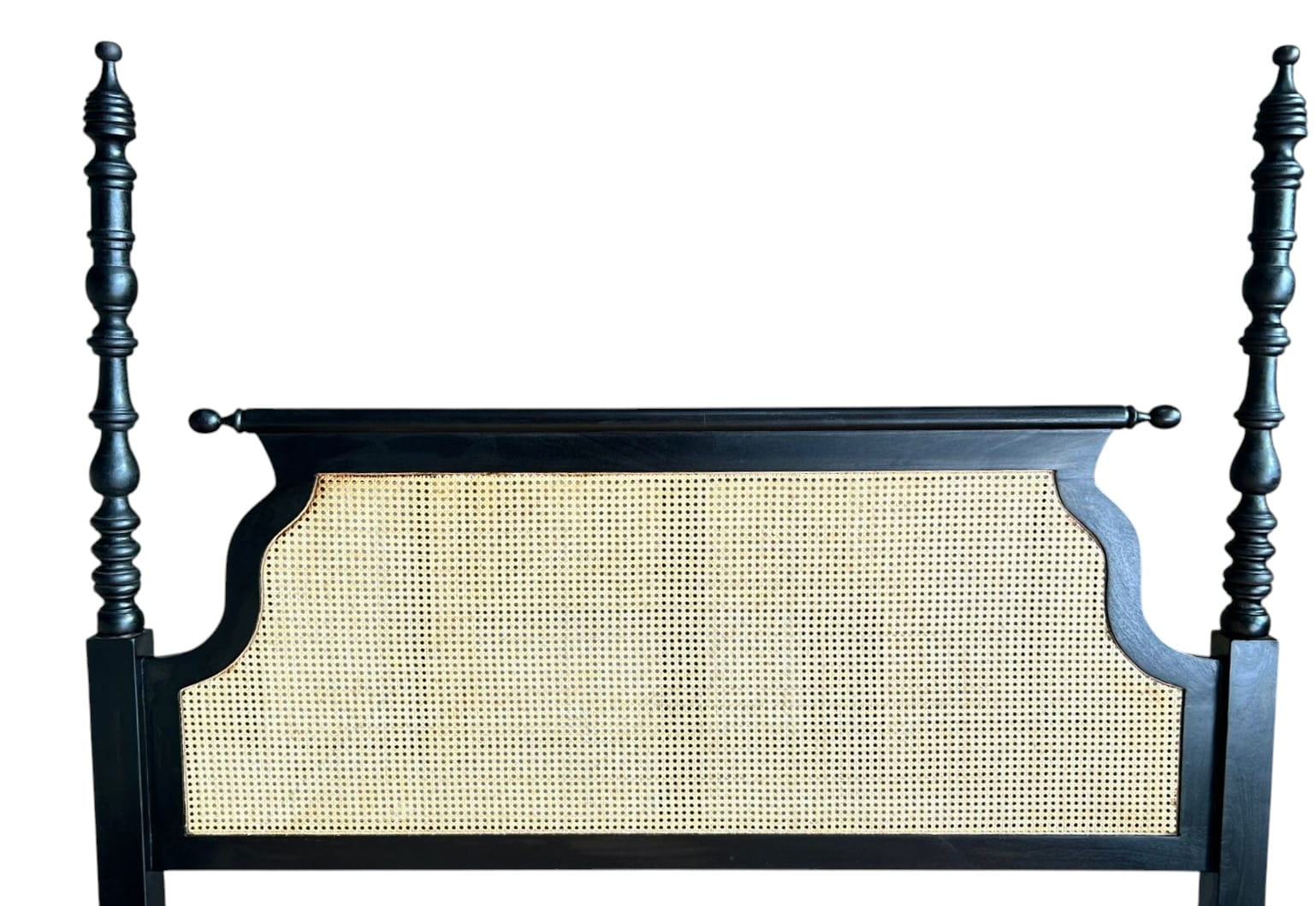 Black wooden headboard with a woven cane design on a white background