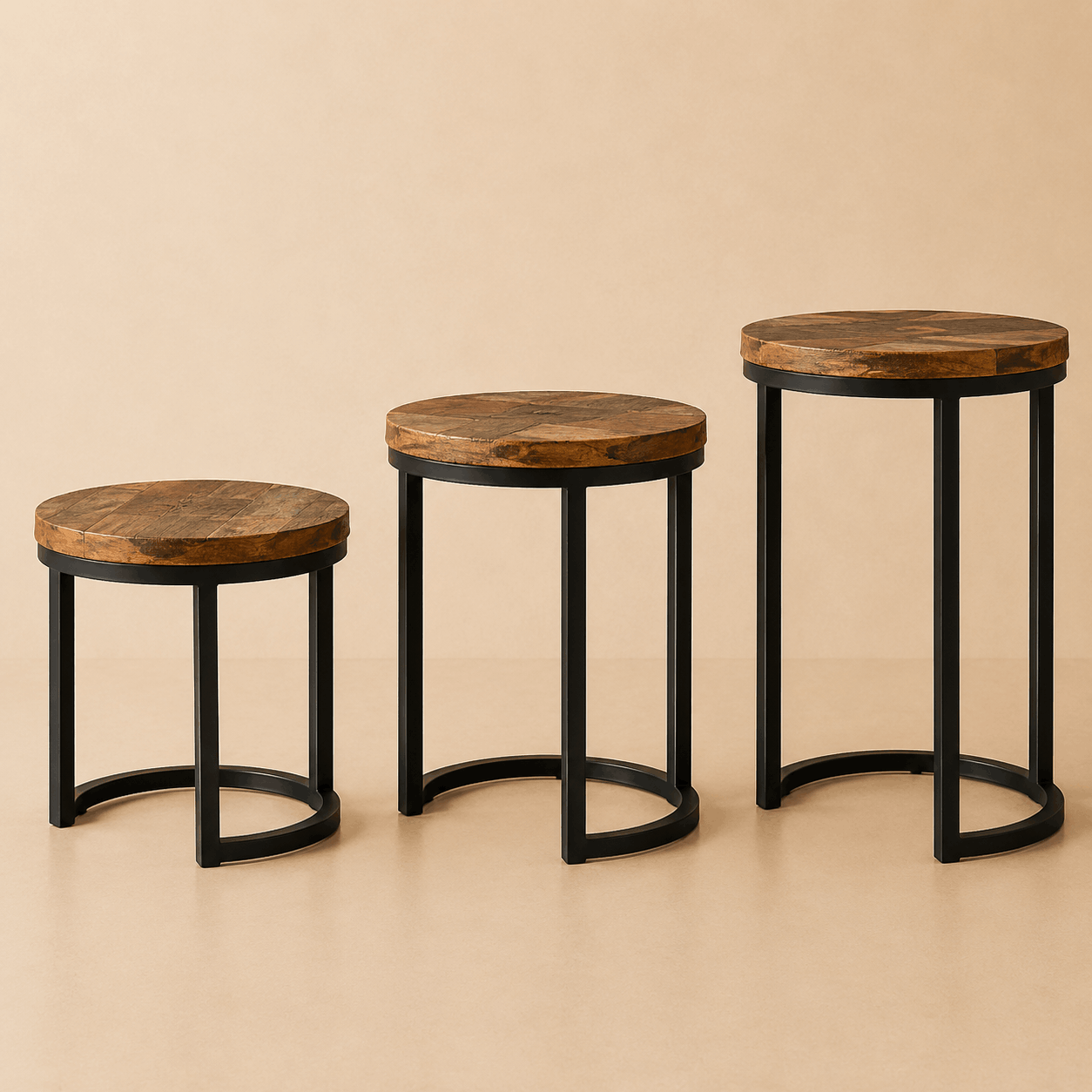 Set of three round wooden side tables with black metal legs and natural wood finish