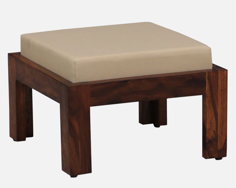 Wooden stool with a beige cushion on a white background