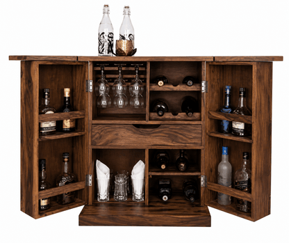 Wooden bar cabinet with open doors displaying bottles and glasses on a white background