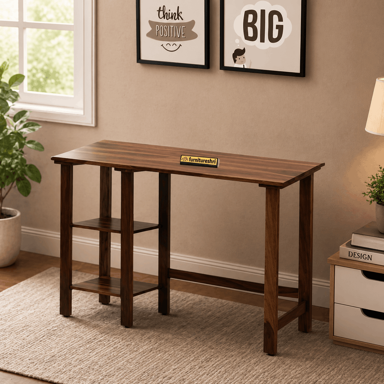 Wooden console table in a room with framed pictures on the wall and a plant.