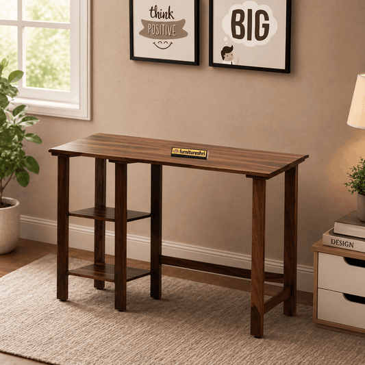 Wooden console table in a room with framed pictures on the wall and a plant.