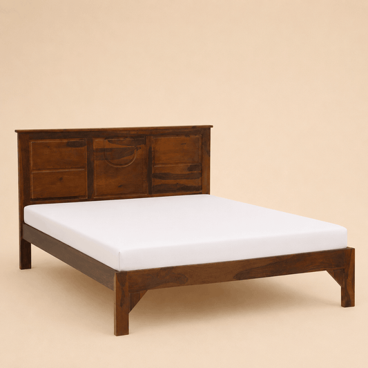 Wooden bed frame with a white mattress on a beige background