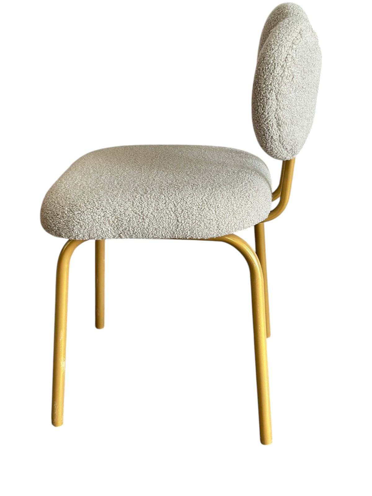 Chair with textured beige cushioned seat and backrest on yellow metal legs against a white background