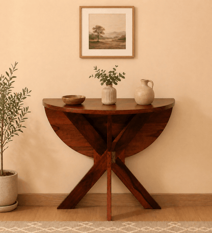 Wooden side table with decorative items against a beige wall