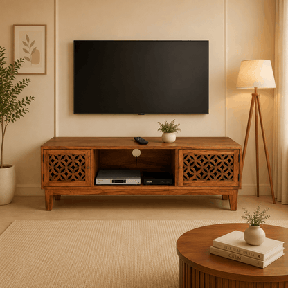 Wooden TV stand with decorative elements in a living room setting