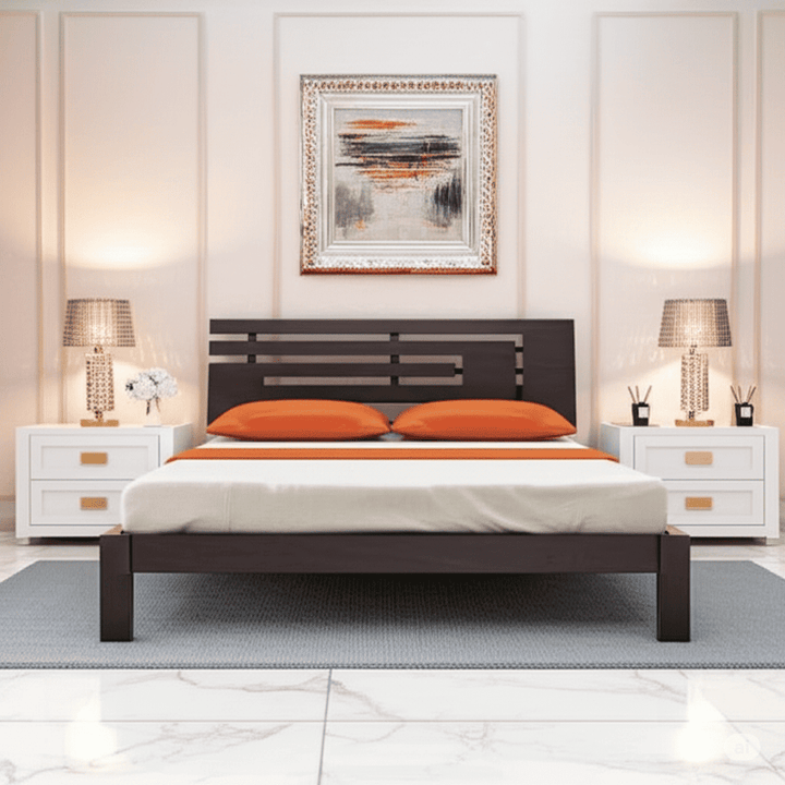 Modern bedroom with a wooden bed, white nightstands, and orange pillows.