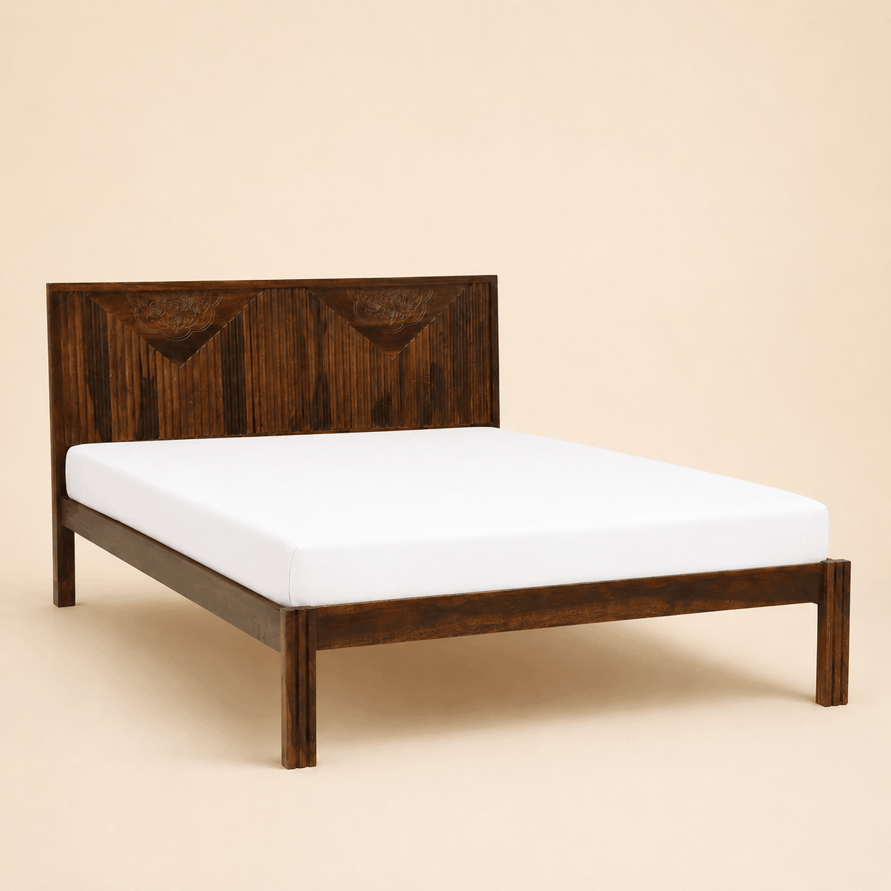 Wooden bed frame with a white mattress on a beige background