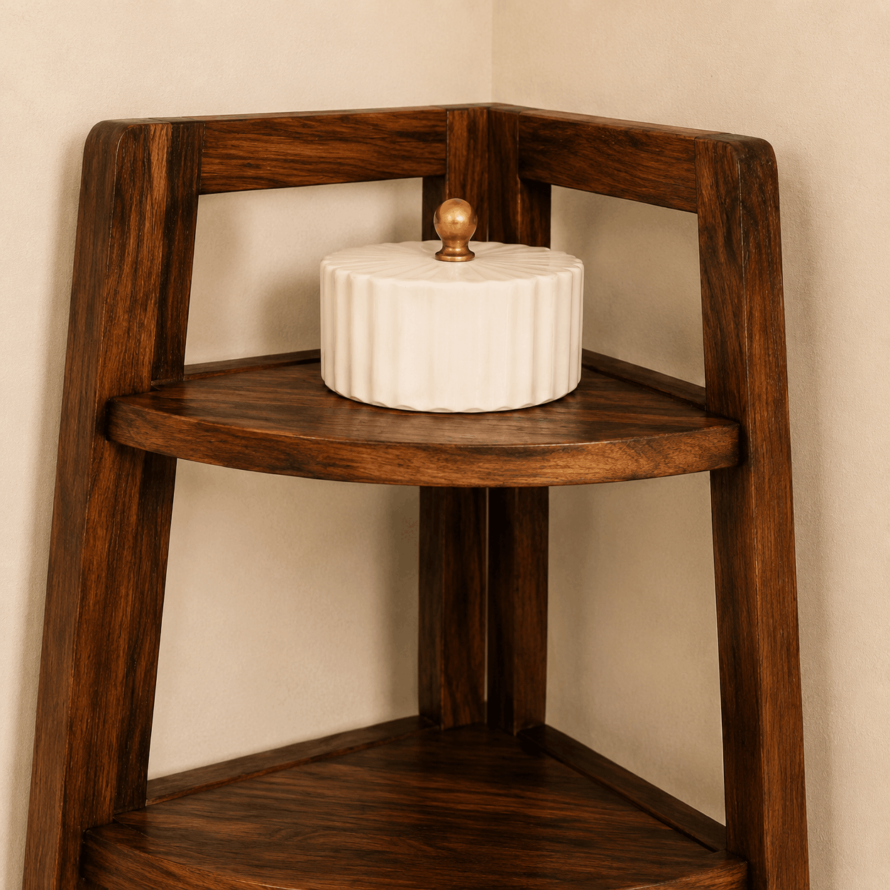 Wooden corner shelf with a white decorative item on a beige wall background