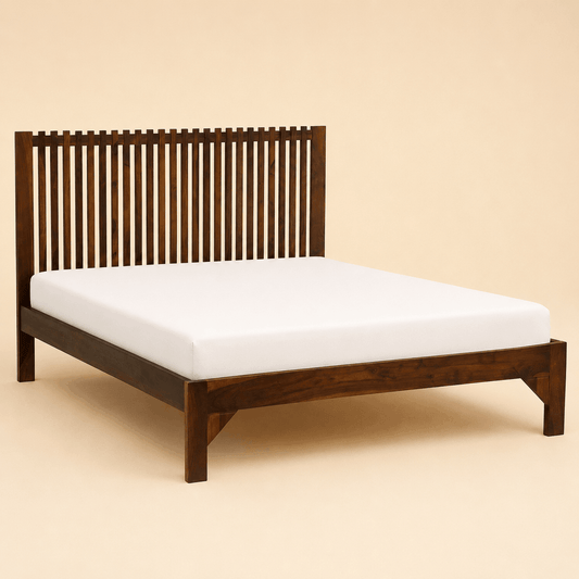 Wooden bed frame with white mattress on a beige background