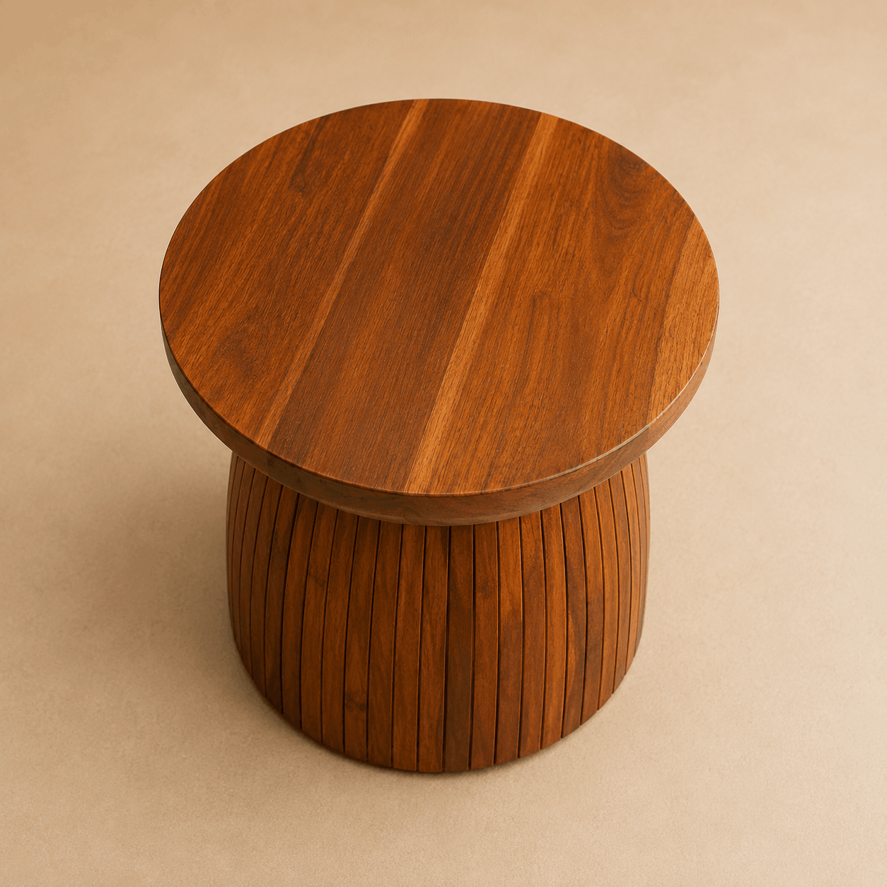 Wooden side table with a round top and cylindrical base on a beige background