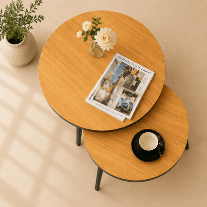 Round wooden coffee table with a magazine and cup on a beige background