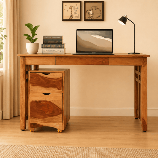 Wooden desk with laptop, books, and lamp in a home office setting
