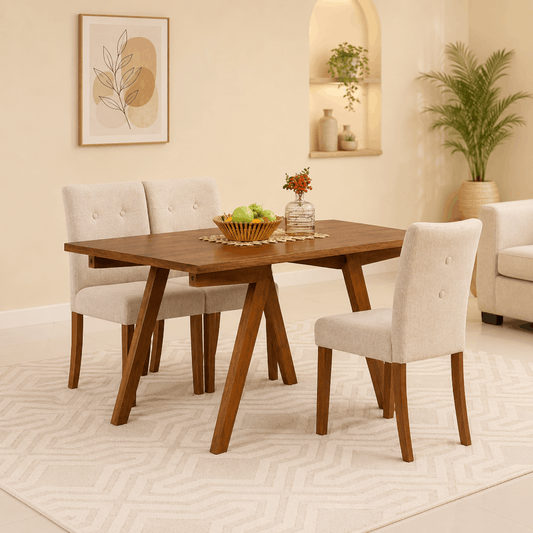 Dining room with wooden table and chairs, decorative elements, and plants.