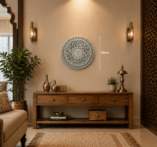 Decorative wall art above a wooden console table in a living room setting.