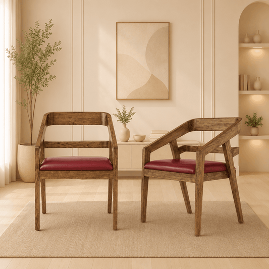 Two wooden chairs with red cushions in a living room setting.